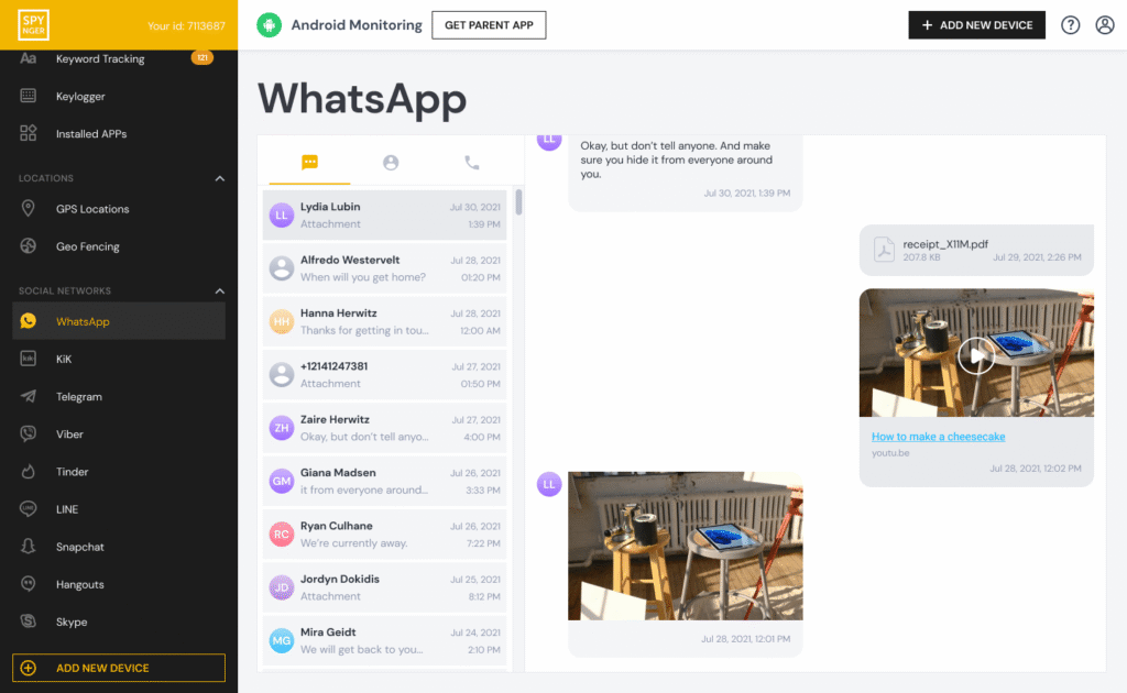 A mother and her teenage daughter smiling while looking at the smartphone screen together in their living room.