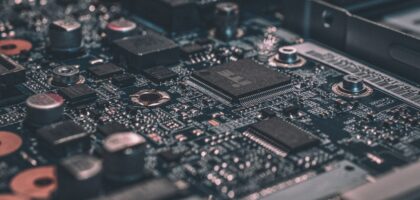 Cyber harassment investigation analyst reviewing digital evidence on a laptop